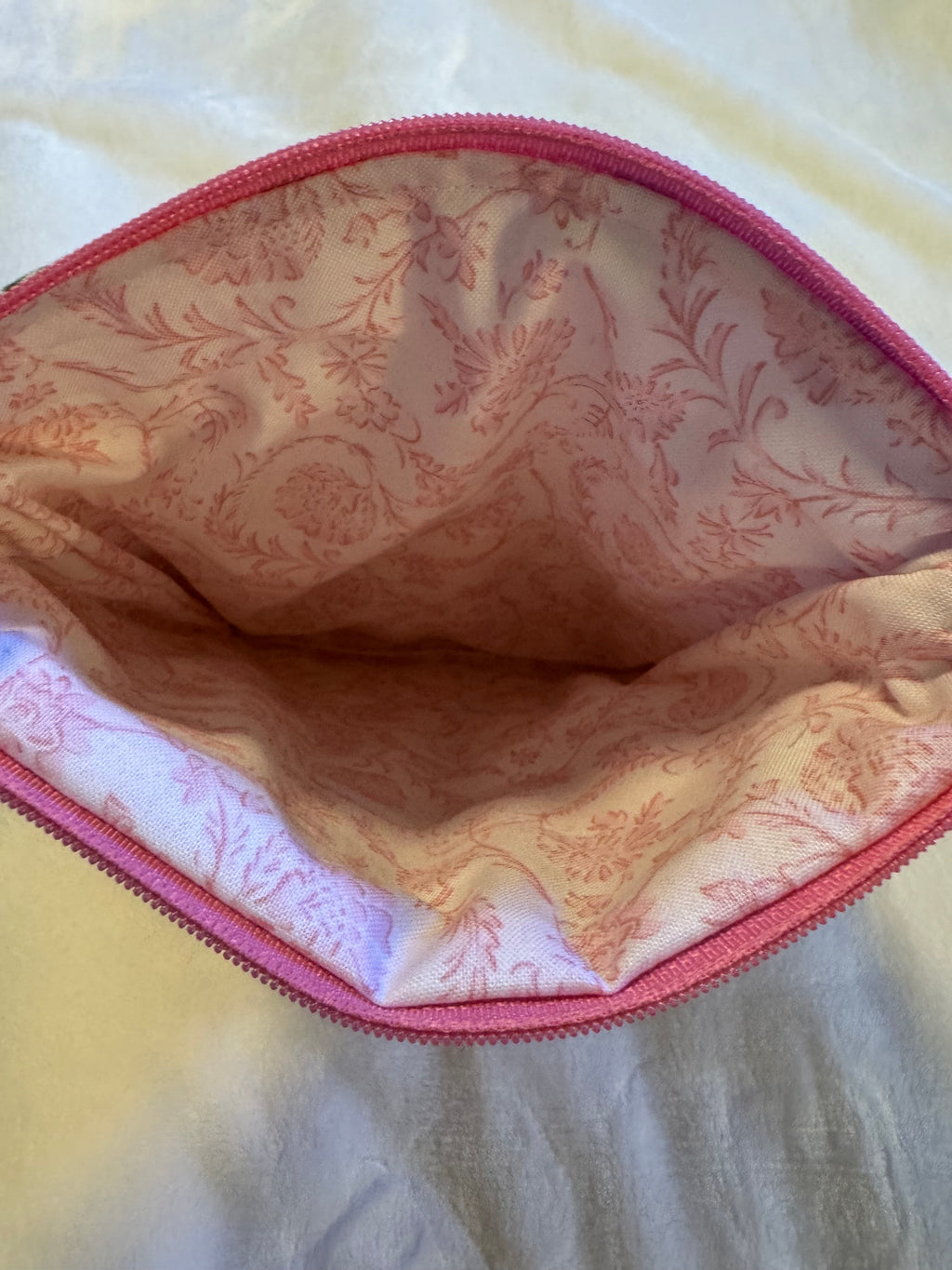 Sweet Cherry Pie Pink Kindle Sleeve shown next to a small Bible and paperback book for size comparison