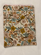 Folk Floral Tablet Sleeve shown with large hardback book to demonstrate fit