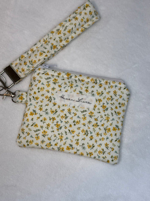 Buttercup Meadow Quilted Wallet - front with wristlet strap
