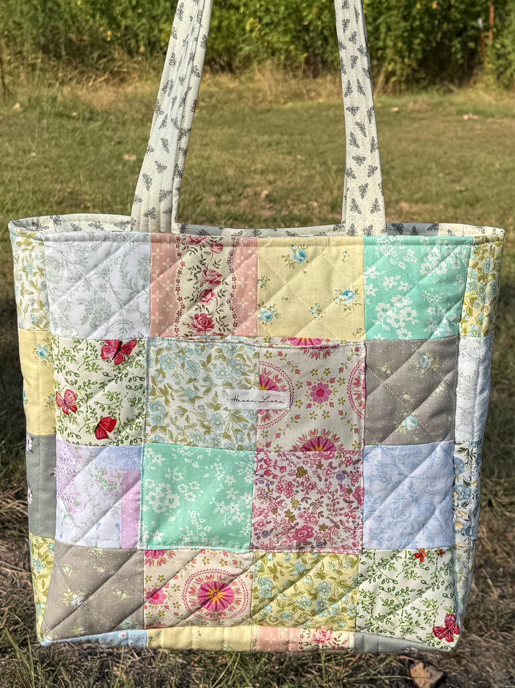 Cottage Patchwork Tote side angle view showing depth and double handles