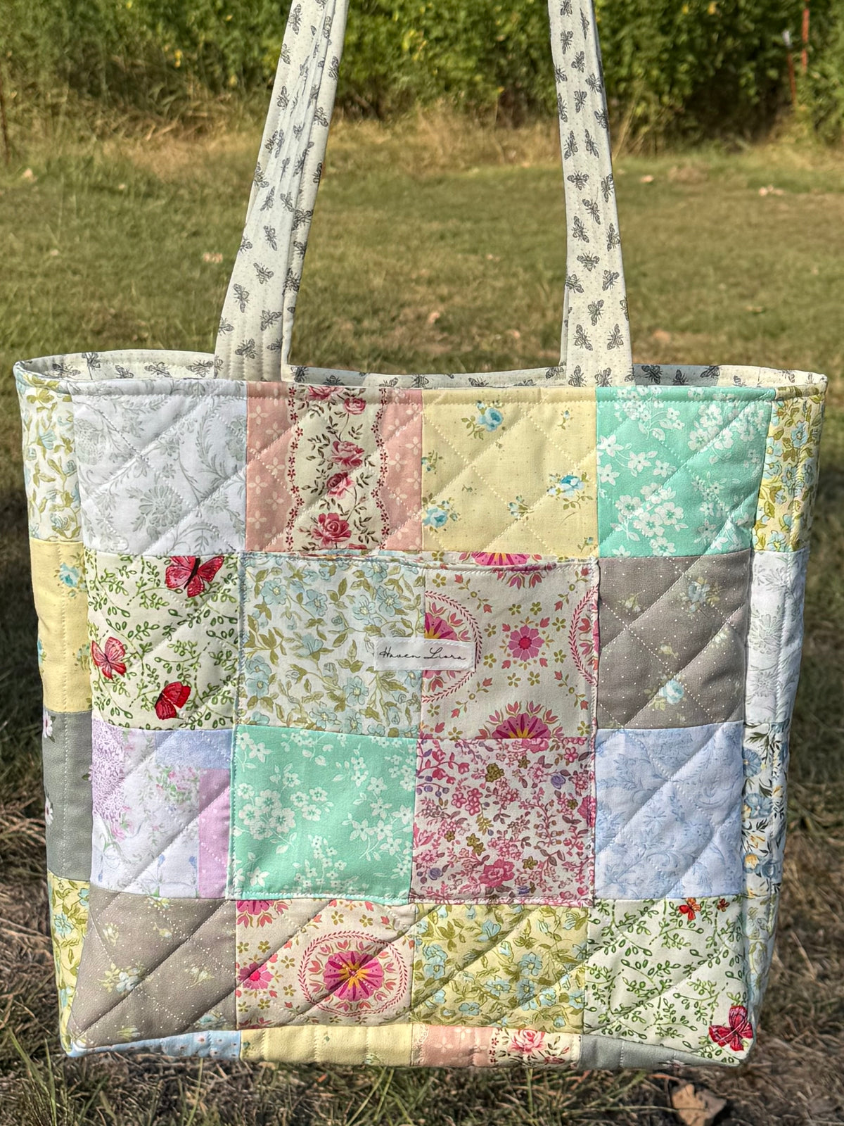 Cottage Patchwork Tote side angle view showing depth and double handles